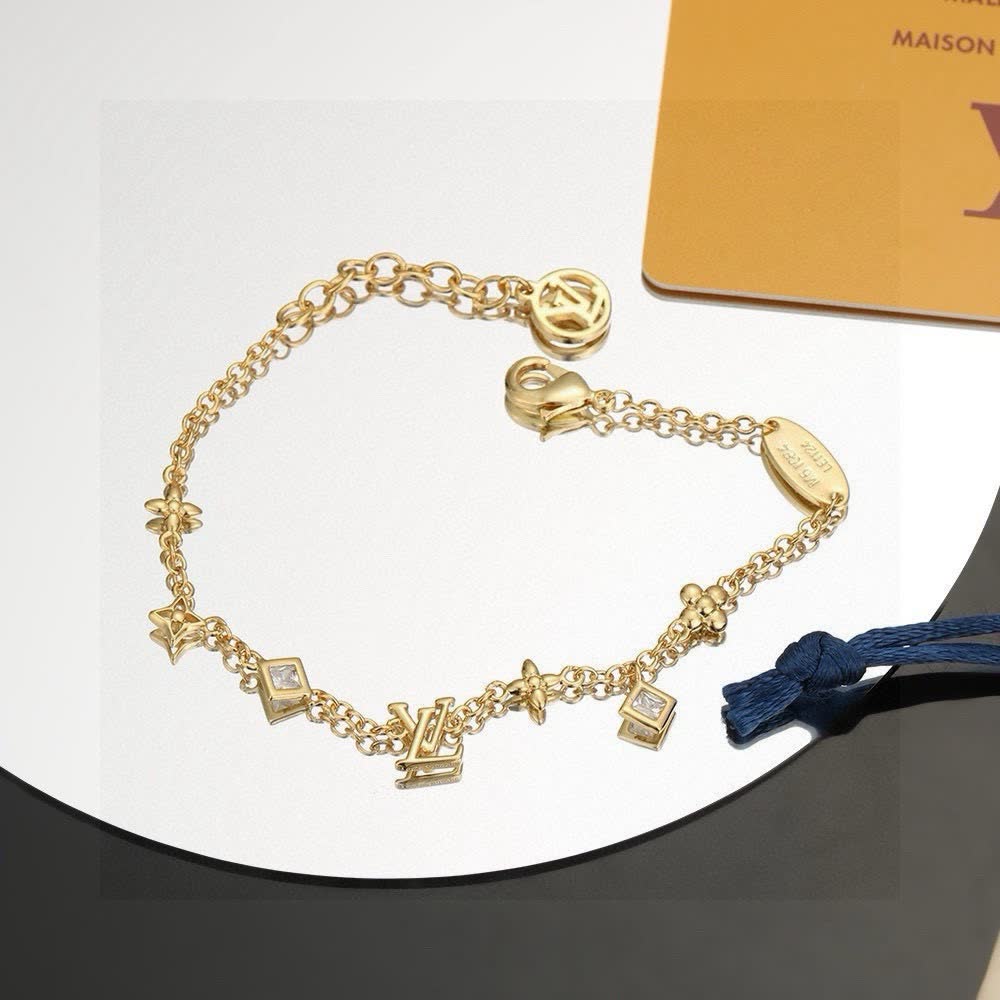 Louis Vuitton Gold Tone Charm Bracelet Louis Vuitton Gold Tone Charm Bracelet